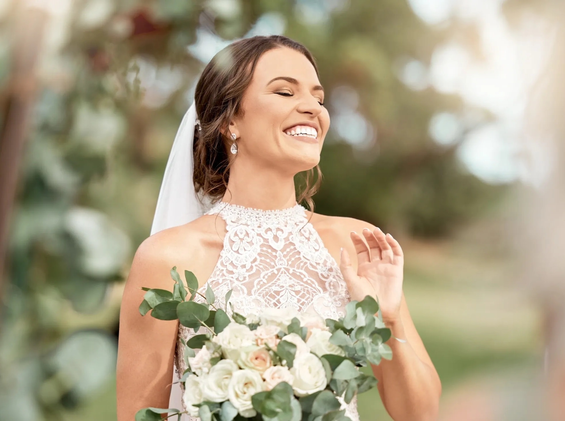 Beautiful bridal bouquet with blush pink roses and eucalyptus