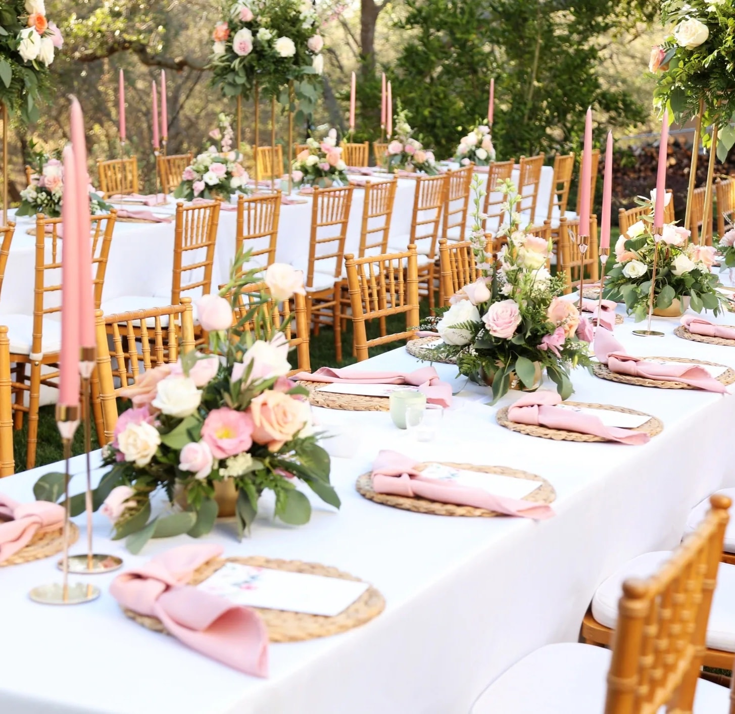 Low romantic wedding centrepiece with flowers and candles